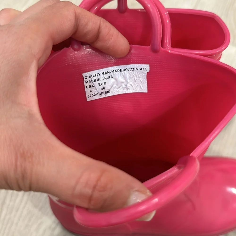 Pink rain boots